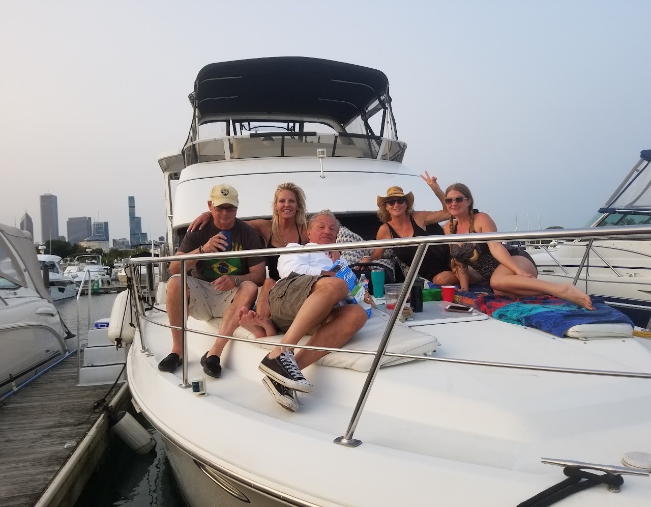 Guests lounging on yacht bow