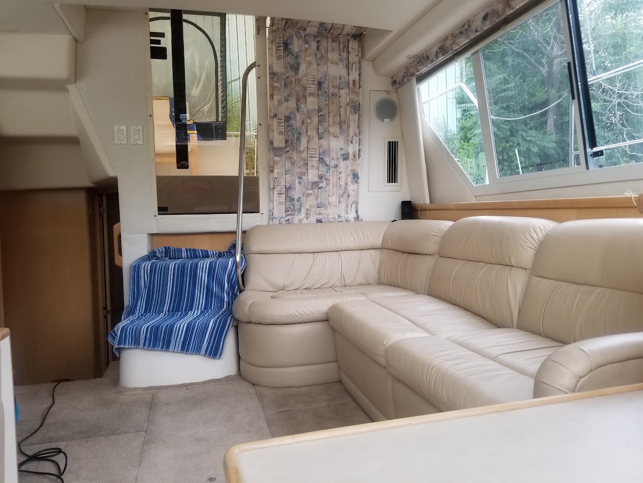 Leather salon lounge couch inside yacht cabin